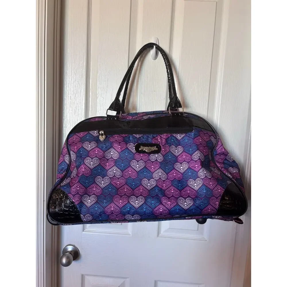 Kathy Van Zeeland 22-inch rolling weekender duffle bag.